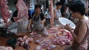 Commerce de viande en Chine © Andrew Hitchcock